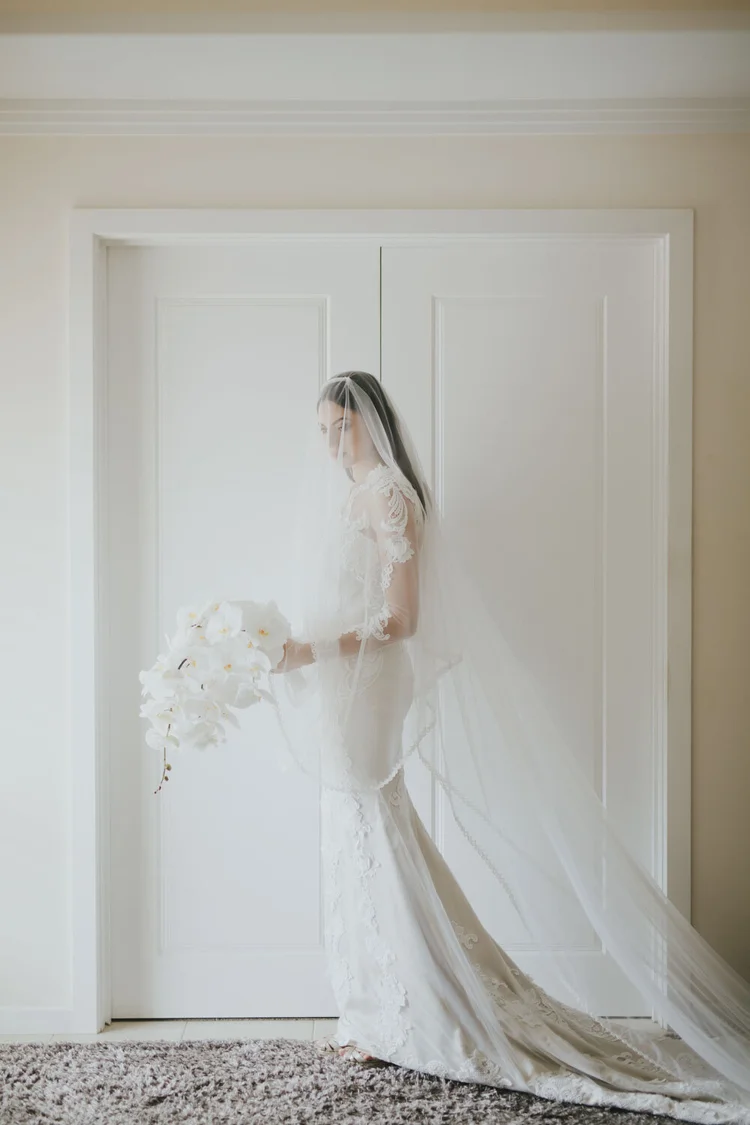 Bride in profile beneath a veil