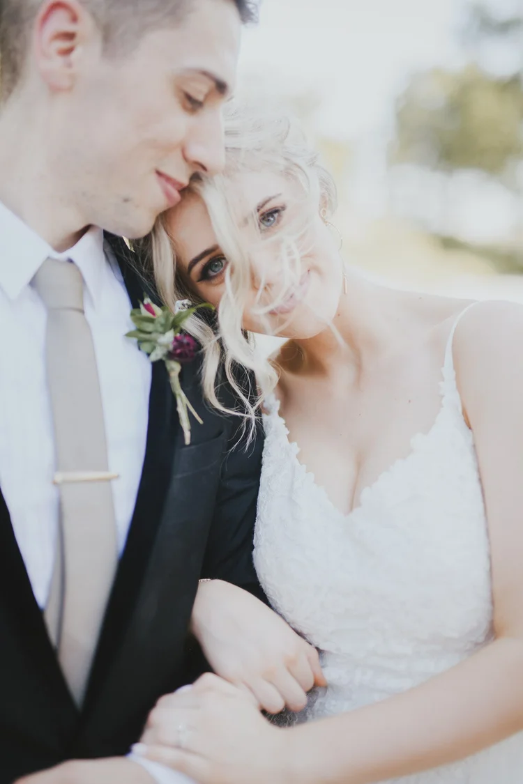 Newlyweds sharing a close portrait